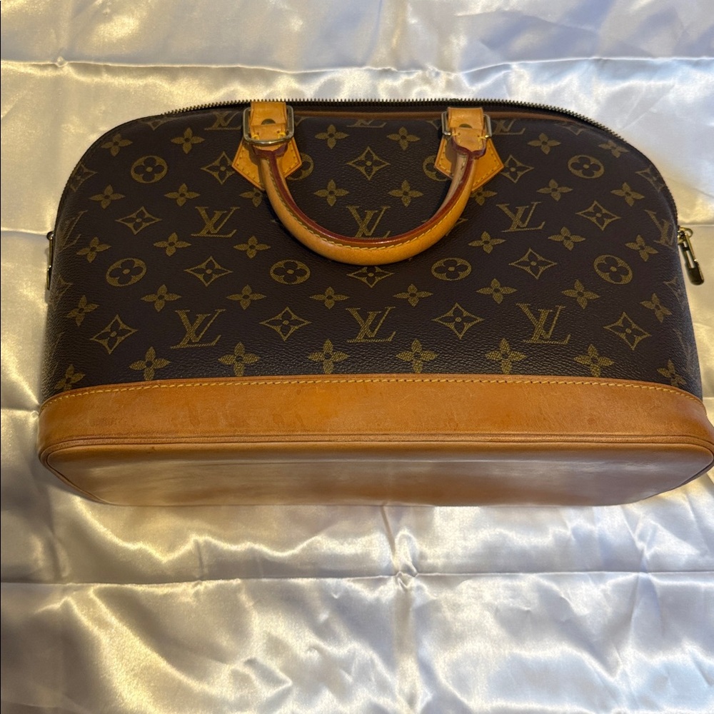 Louis Vuitton Alma Handbag Monogram Canvas  12